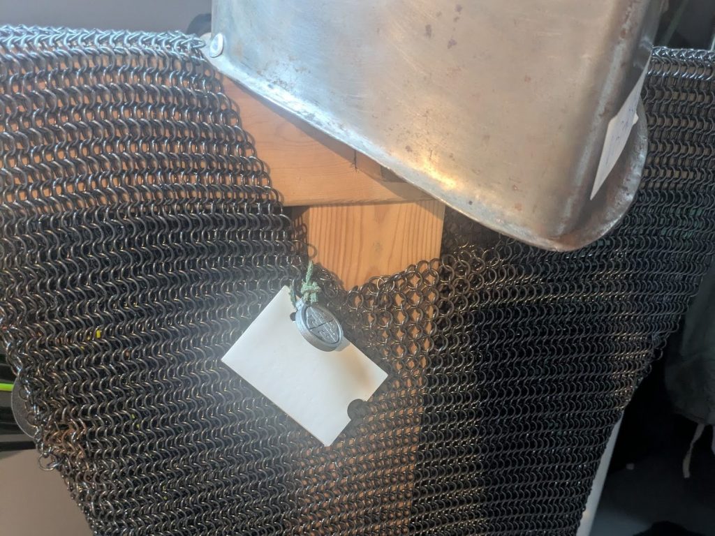 The token and lammie from the previous image are shown tied to chainmail armour